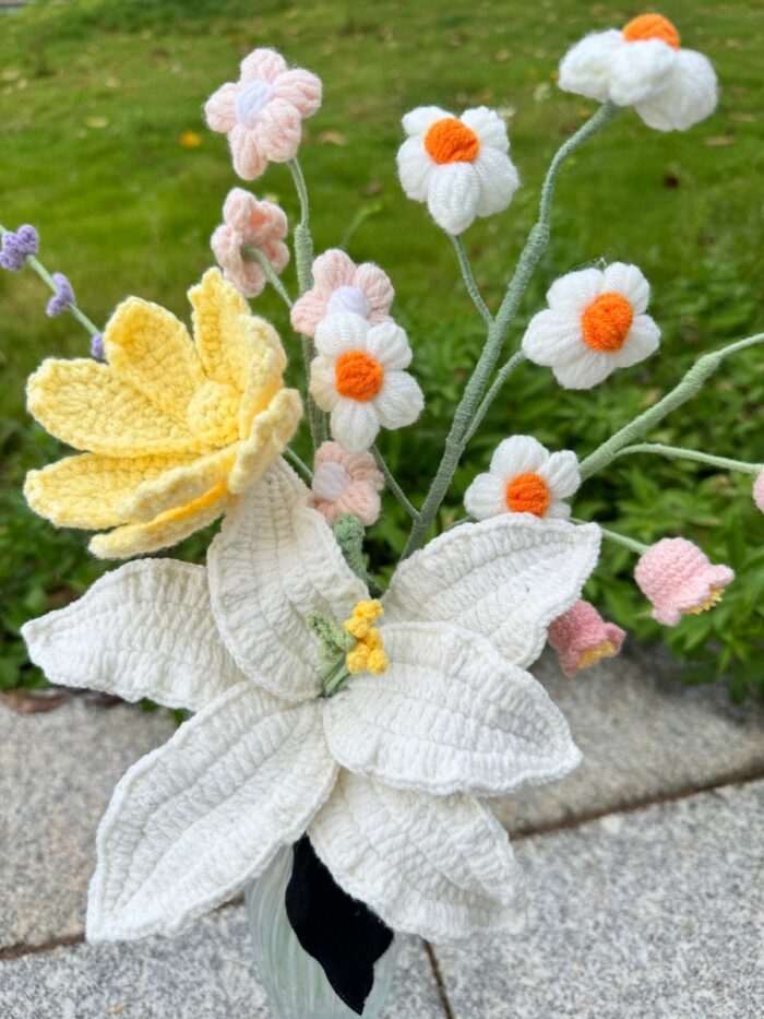 a knitted flowers in a vase